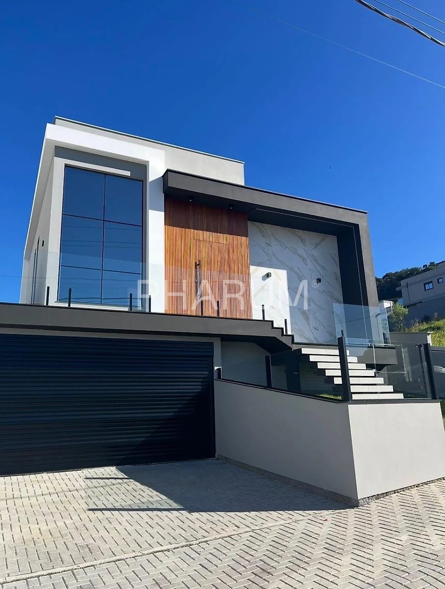 Casa 3 dormitórios e piscina no Green Village Palhoça